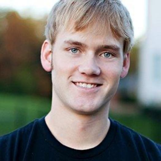 Smiling young man with blond hair
